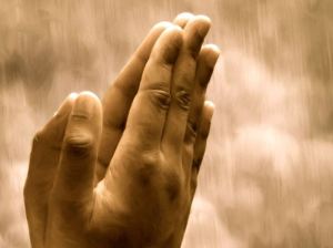 manos rezando